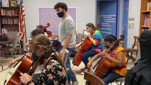 The Ross Community Center, which was awarded operational funding from The Community Foundation, provides innovative youth and adult programming to enhance lifelong learning, like orchestra instruction (pictured), along with community services, including a weekly community market.