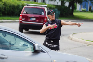 Dale Basham directs traffic at the County Fair. Photo provided.