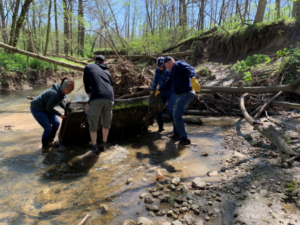 Delaware County Soil and Water Conservation District received a $10,000 grant to address environmental problems in the Upper White River Watershed. A similar grant in 2020 supported work in the nearby Upper Mississinewa River Watershed. Pictured, Volunteers participate in the McVey River Clean-Up hosted by the Upper Mississinewa River Watershed and Red-Tail Land Conservancy. Multiple bags of trash, a tire, and a mattress were removed from the watershed. Photo provided