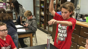 An MCS student works on a science experiment. Photo provided.