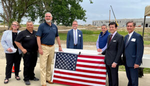 Pictured Left to right: Traci Lutton, Vice President of Muncie-Delaware County Economic Development Alliance; James King, Delaware County Commissioner; Indiana Gov. Eric Holcomb; Brad Bookout, Director of Economic & Municipal Affairs; Tom Johnson, Regional Manager of CANPACK-US; Peter Giorgi, President and CEO of Giorgi Global Holdings, Inc.; Mayor Dan Ridenour, City of Muncie. Photo by Tylonius Studio, Inc.