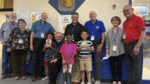 Muncie Exchange Club Members helped Longfellow Elementary School students shop for books at United Way’s Summer Book Give-Away program.