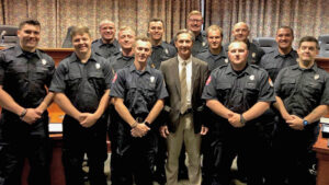 Front Row, Left to Right: Jacob Sutton, Adam Burk, Jackson Rumble, Mayor Ridenour, Keegan Jones, Tyler Lechien Back row, Left to Right: Caine Orme, Keatyn Knight, Jeffrey Johnson, Alexander Hancock, Thomas Mares, Brenton Miller, Zane Dickson