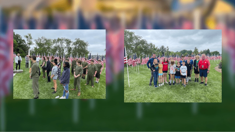 Members of the Muncie Central High School JROTC and members of the Muncie Northside Middle School cross country team pose by the field of flags after helping with the setup for Flags of Honor on Tuesday, September 6.