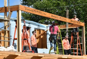 Accutech staff members are pictured on a recent Habitat for Humanity build. Photo provided