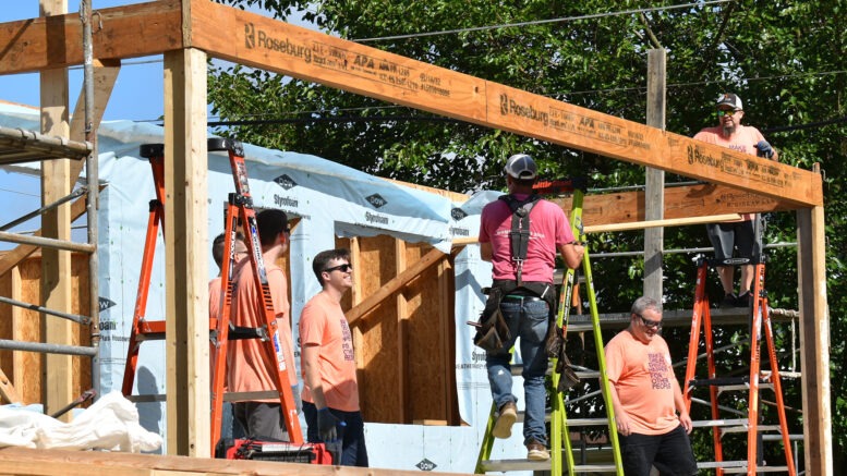 Accutech staff members are pictured on a recent Habitat for Humanity build. Photo provided