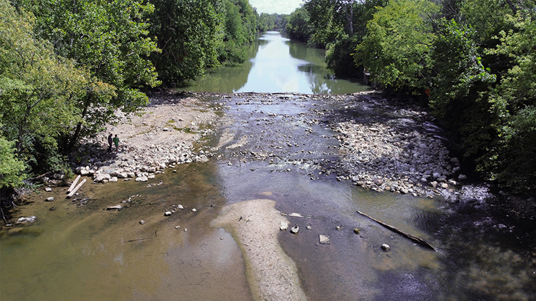 Modified dam photo. White River seen flowing downstream over newly installed riffle. Photo provided by Indiana American Water.