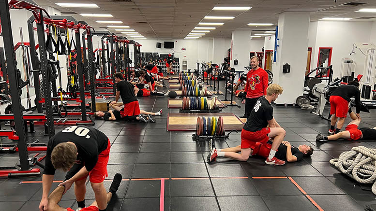 The Ball State University baseball team work with Arsenal coaches, including head coach Eric Van Matre, center, during a workout at the Ball State University Speed Strength and Conditioning Room. The Arsenal oversees performance training for all team athletes for this baseball season. Photo provided