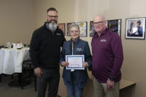 L-R: Joe Wrin, Franchise owner, Rebecca Moles, Caregiver of the Year, and Steven Leach, Franchise Office Manager.
