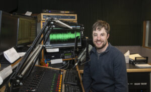 Jared Boomer is pictured in WLBC's master command studio. Photo by Mike Rhodes