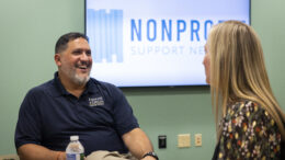 Daniel Gurule, Manager of Donor Relations for The Arc of Indiana Foundation and Erskine Green Training Institute interacts with Mandy Williams, Vice President of Programs at LifeStream Services, Inc., during a peer group meeting in 2022.