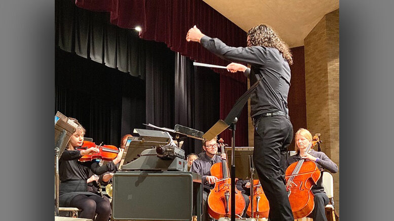 Conductor Carlos Hernandez leads the East Central Indiana Chamber Orchestra of Muncie.