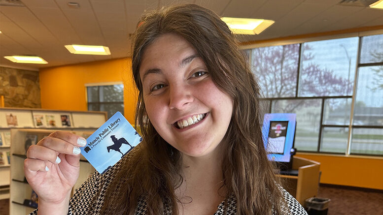 Ball State senior Madeline Shelton is getting her free Muncie Public Library card at Kennedy Library. The psychological sciences major said she is excited to use the card while she’s in graduate school at Ball State this fall.