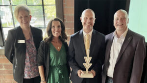 Pictured L-R: Jeannie Hamblin-Fox, Rebekah Ireland, John Thompson, Chancellor Jeffrey Scott