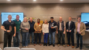 Pictured L-R: Travis Street, Mike Martin, Jennifer and Tom Sheridan, Frank Scott II, Debra and Jeff Williams, Chad Massoth, Brad Bookout, and Bill Walters. Photo provided