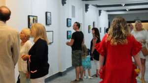 Visitors view art inside the Judith Barnes Memorial Gallery at Cornerstone Center for the Arts. Photo provided