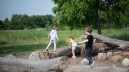 Children play at Red-tail Land Conservancy’s Dutro-Ernst Woods’ Nature Area. Photo by Maggie Manor
