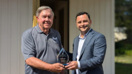 Community Foundation Board Chair Casey Stanley presents the 2024 David Sursa LeadershipAward to Jim Rosema for his service to Muncie Mission during a special presentation on August 20. 2024. Photo provided