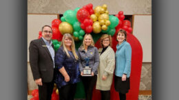 First Merchants team members with an award from Habitat for Humanity. Photo provided