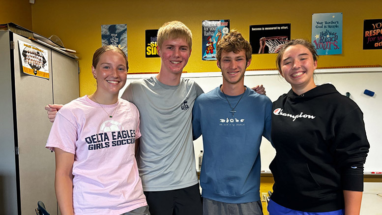 Pictured L-R: Grier Backus standing next to the FCA leaders Allen Crouch, Hudson Ewing, and Ruth Sherck. Photo provided