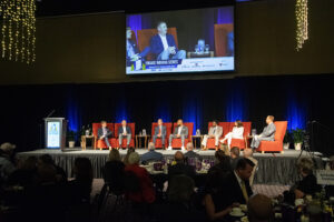 Panelists pictured L-R included: Trevor Friedeberg, Mark K. Hardwick, Geoffrey S. Mearns, Ronald Morrell Jr., Lathay R. Pegues, State Rep. Elizabeth Rowray and moderator Gerry Dick.  Photo by Mike Rhodes