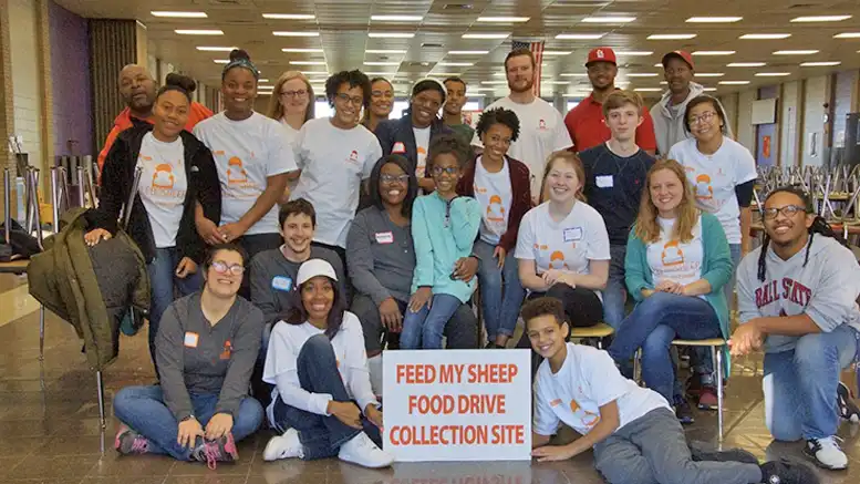 Volunteers of a past food drive gather inside of Muncie Central High School. The high school is one of the sites for this year's food drive and is the place where Thanksgiving Dinners can be received. Photo provided, Feed My Sheep.