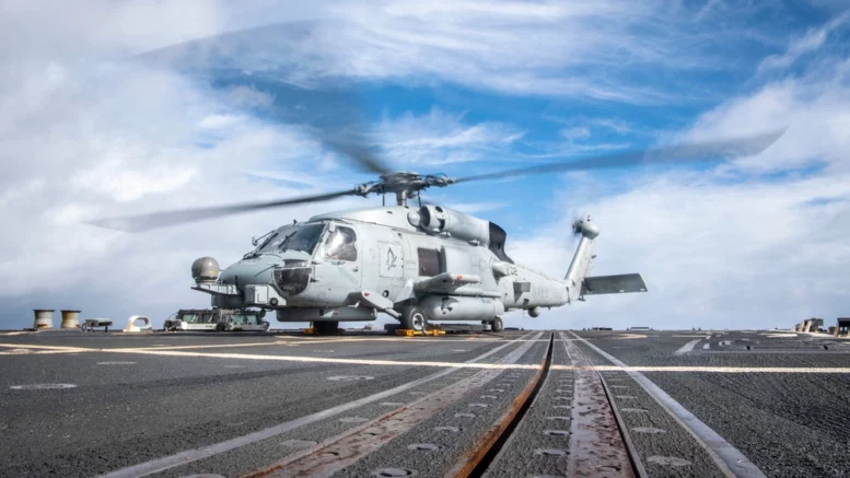 PACIFIC OCEAN (Nov. 25, 2024) - An MH-60R Sea Hawk assigned to the “Blue Hawks” of Helicopter Maritime Strike Squadron (HSM) 78 prepares to take off on the flight deck aboard Arleigh Burke-class guided-missile destroyer USS Sterett (DDG 104), Nov. 25, 2024. The Carl Vinson Carrier Strike Group is underway conducting routine operations in the U.S. 3rd Fleet area of operations. U.S. Navy photo by Mass Communication Specialist 3rd Class Brianna Walker.