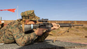 .S. Marine Corps Rct. Michael Graziano with Kilo Company, 3rd Recruit Training Battalion, sights in at a target during the table one course of fire at Marine Corps Base Camp Pendleton, California, Nov. 6, 2024. Table one covers the basic fundamentals of marksmanship and rifle safety in all shooting positions: sitting, kneeling, and the prone. U.S. Marine Corps photo by Lance Cpl. Janell B. Alvarez.