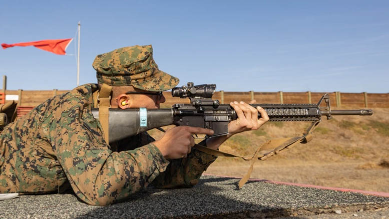 .S. Marine Corps Rct. Michael Graziano with Kilo Company, 3rd Recruit Training Battalion, sights in at a target during the table one course of fire at Marine Corps Base Camp Pendleton, California, Nov. 6, 2024. Table one covers the basic fundamentals of marksmanship and rifle safety in all shooting positions: sitting, kneeling, and the prone. U.S. Marine Corps photo by Lance Cpl. Janell B. Alvarez.