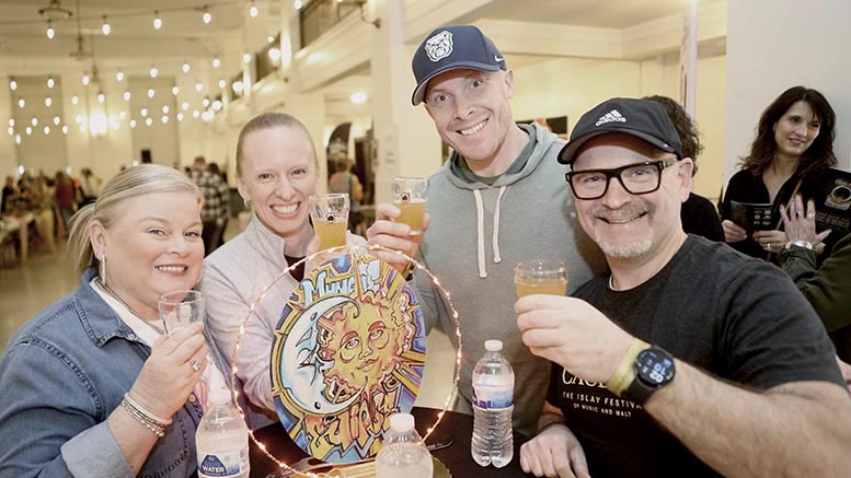 Beer lovers from a prior Brewfest gather to sample a variety of beverages and enjoy some fun and fellowship in downtown Muncie. Photo provided.