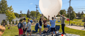 Students from Upland, Indiana, launch a weather balloon during a NearSpace Education event supported by Ball Brothers Foundation, sparking excitement for STEM learning and aerospace careers. Photo provided.