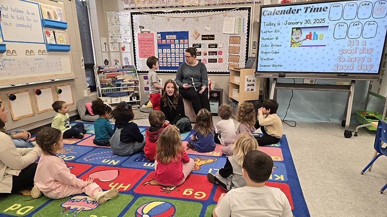 South View Elementary preschool teacher Brylie Foster instructs her students while MCS Elementary Education Administrative Assistant Erin Bousman looks on.